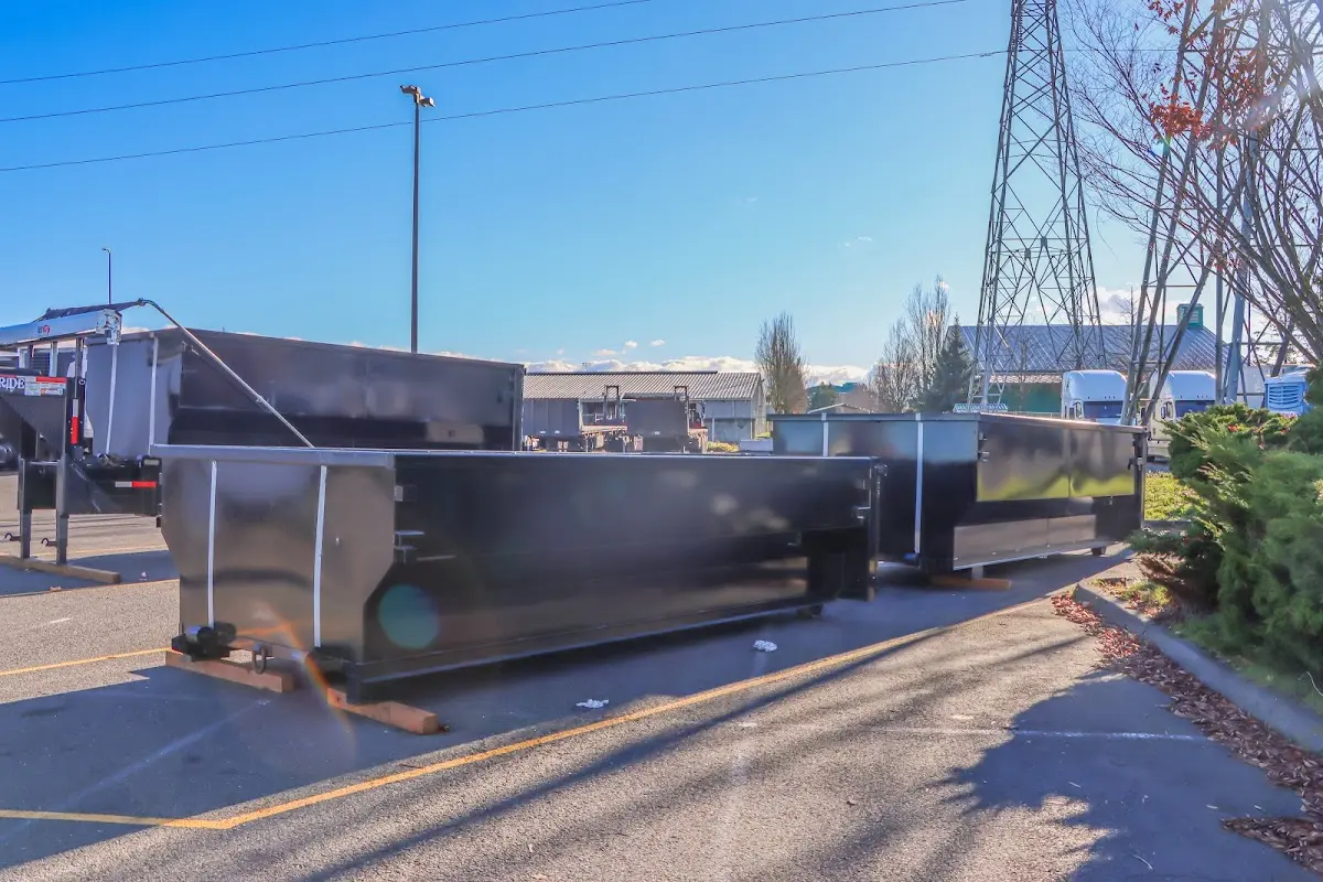 Roll-off dumpster ready for waste disposal at job site for 2 Yard Dumpster Rental in Macedonia